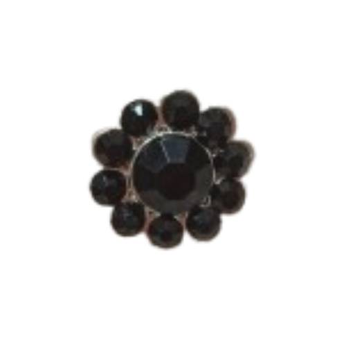 Botón de pedrería negro con forma de flor.